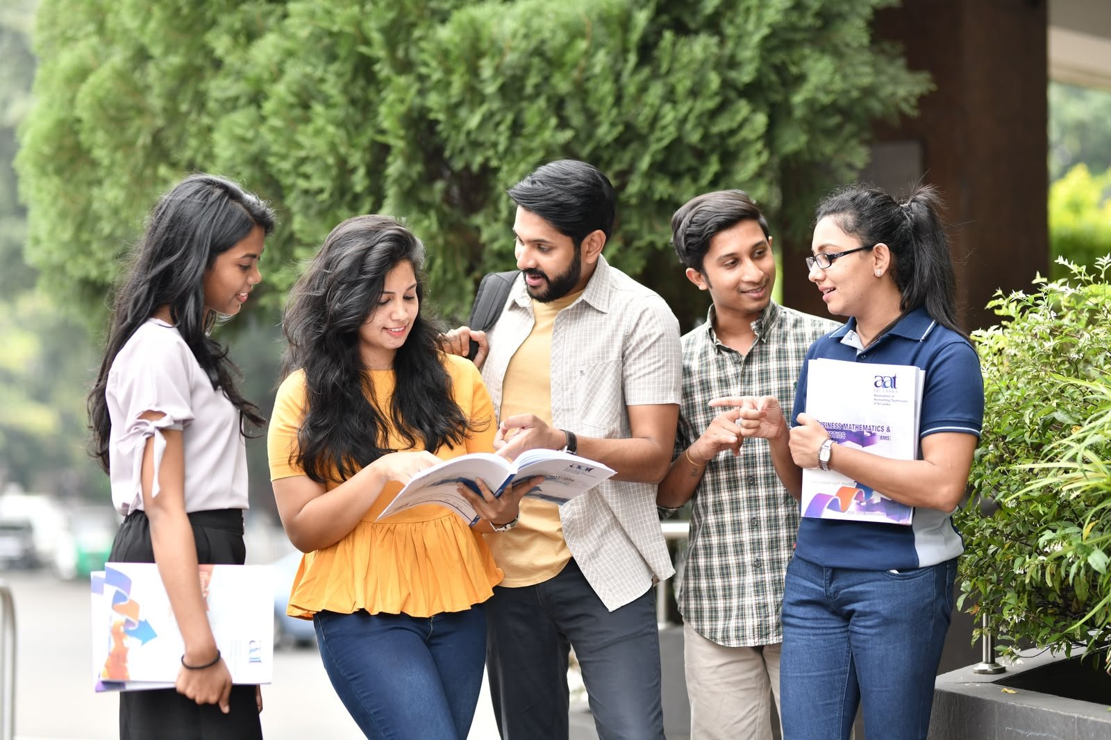 Students studying and graduating